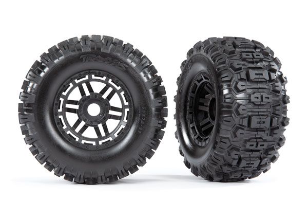 8973 Traxxas Sledgehammer Tires & wheels, glued (black wheels)